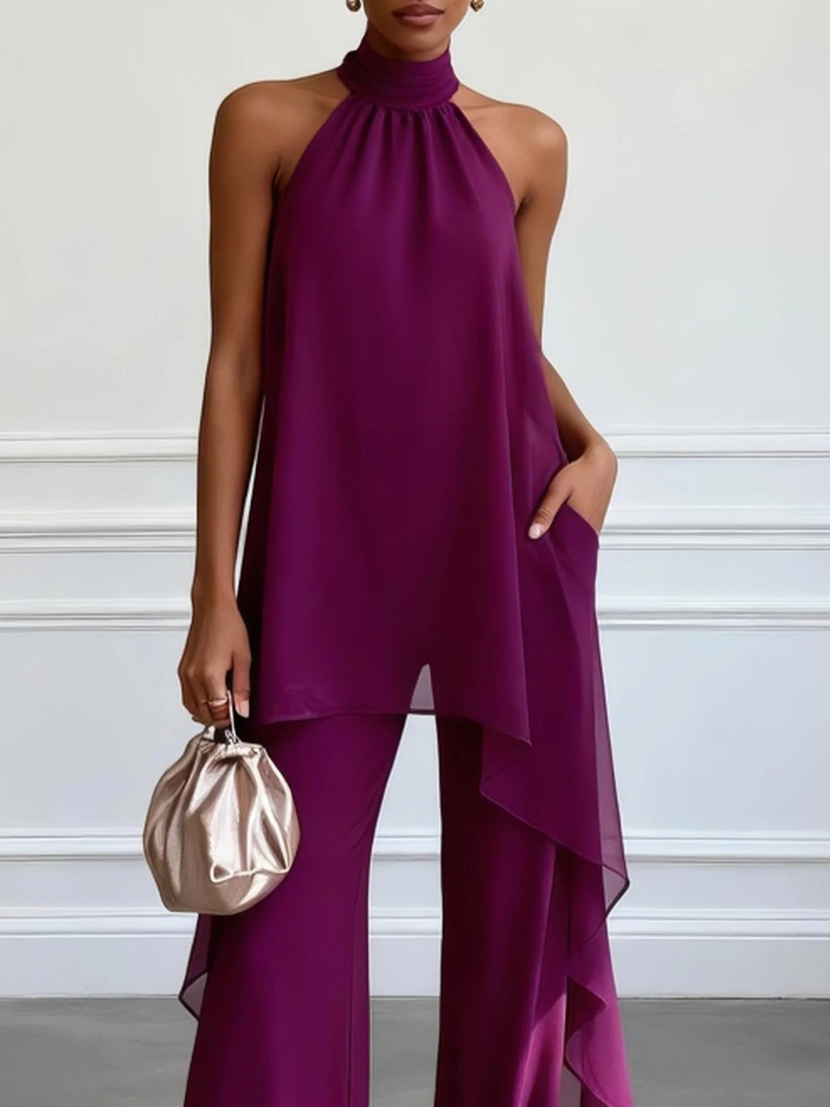 Conjunto elegante a juego de top morado halter y pantalón sastre