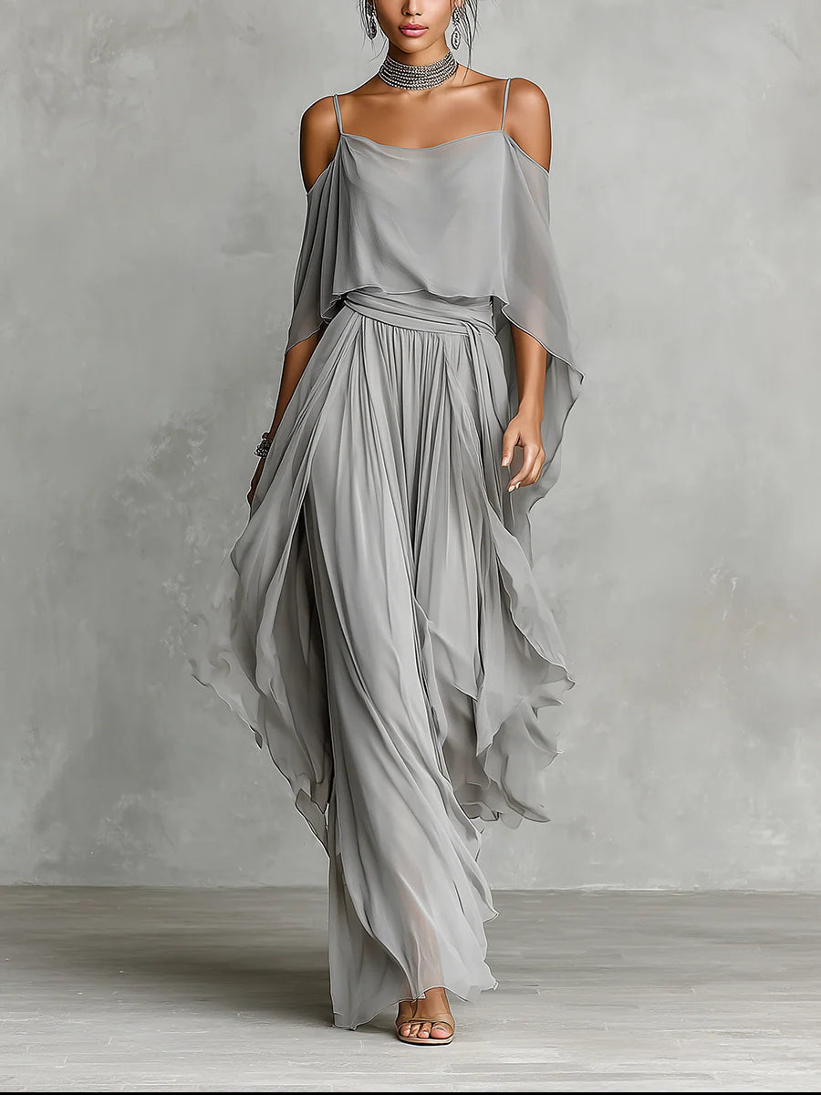 Conjunto elegante gris de blusa de gasa descubierta de los hombros y pantalones de pierna ancha