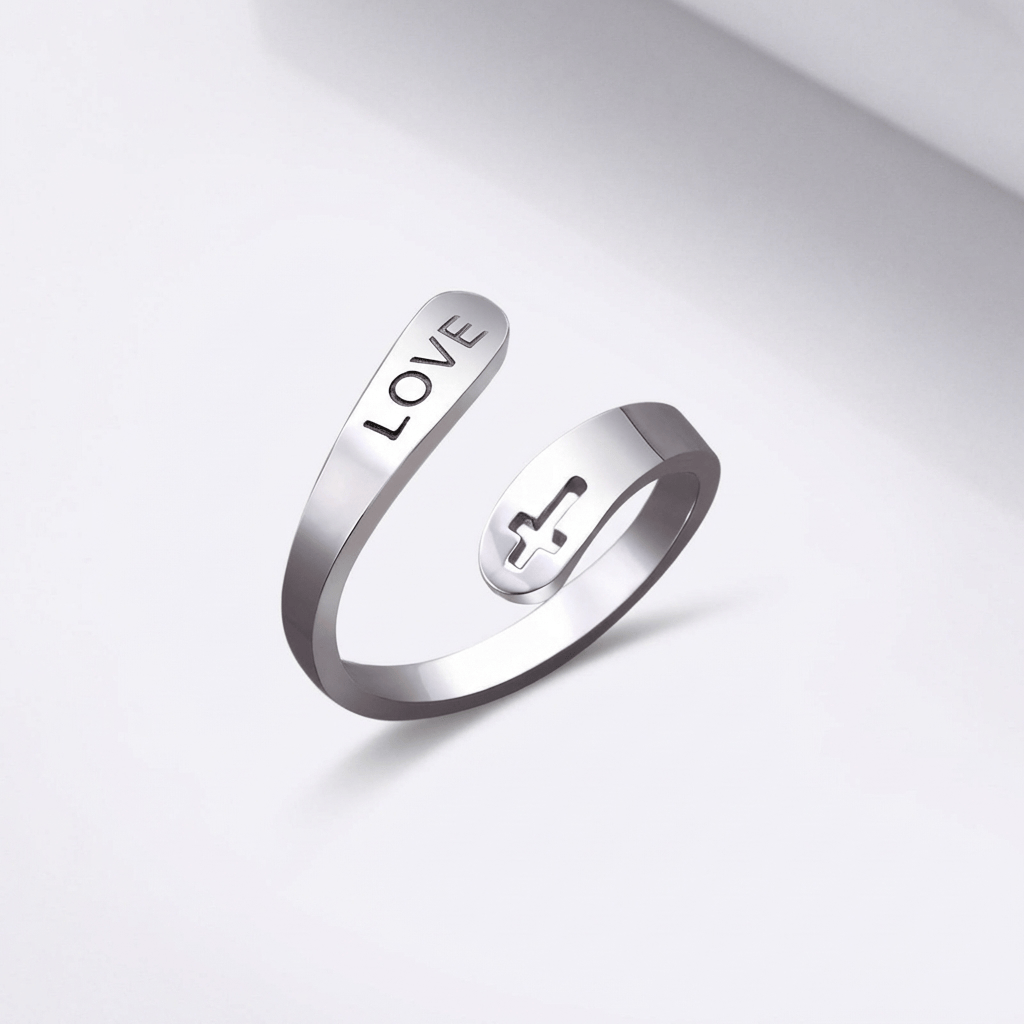 El anillo de la compasión — Cruz con detalle de amor (ajustable)