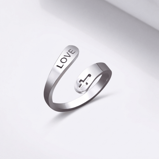 El anillo de la compasión — Cruz con detalle de amor (ajustable)