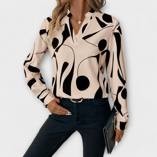 Lara | Elegante blusa estampada con volantes
