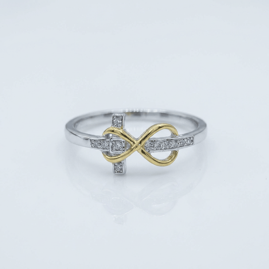 El anillo Heritage: banda de cruz bicolor en plata y oro