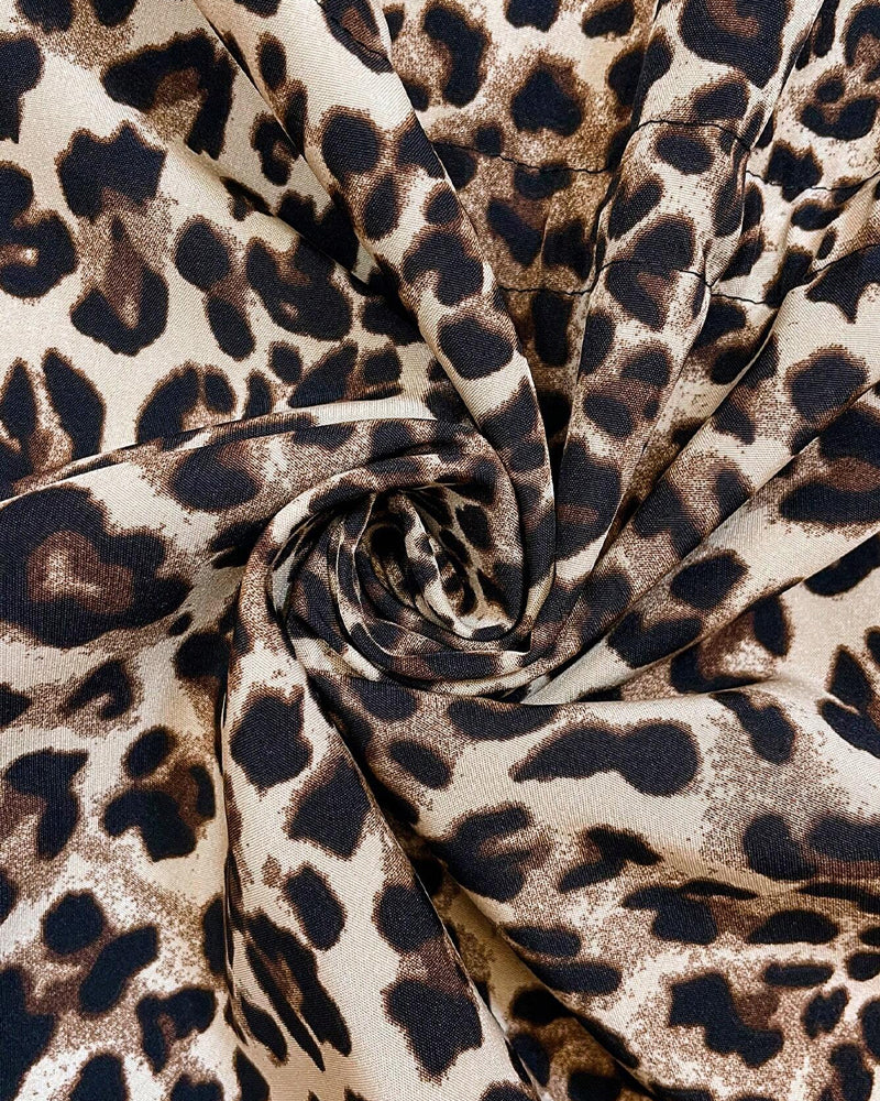 Parka reversible con capucha y estampado de leopardo