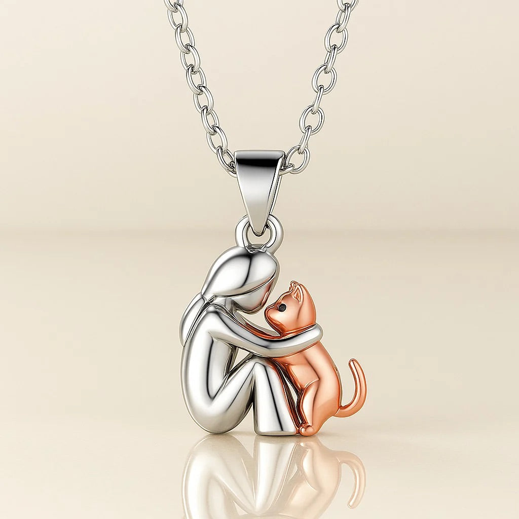 El colgante del abrazo — Collar de mujer y gato