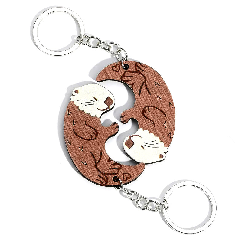 Set de llaveros de nutrias amorosas (2 piezas)