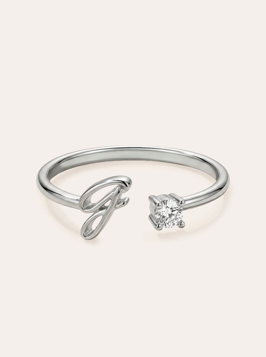 Valentia – Anillo con letra y circonitas