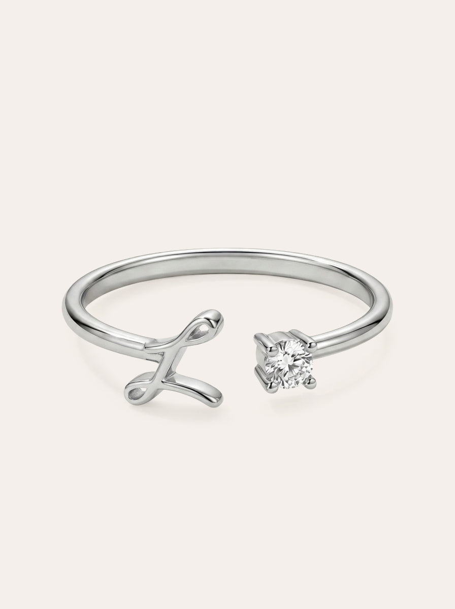 Valentia – Anillo con letra y circonitas