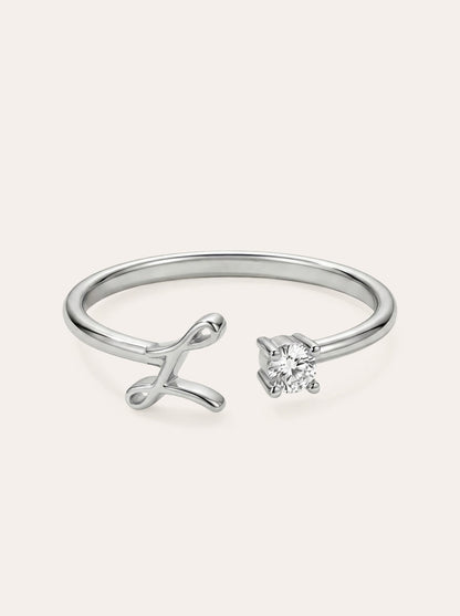 Valentia – Anillo con letra y circonitas