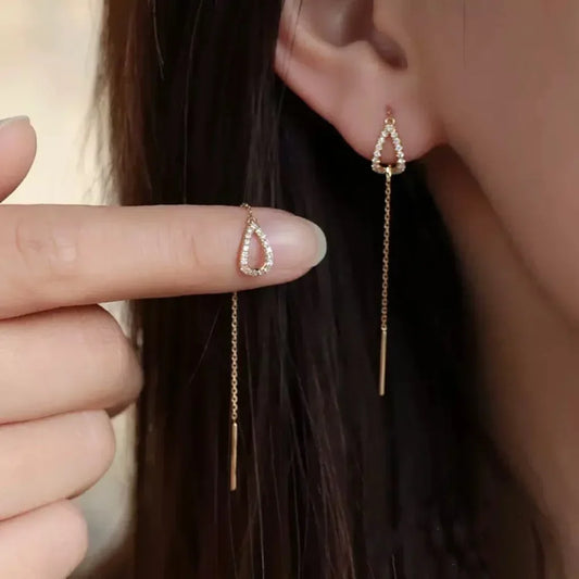 Los pendientes de borlas El Fin