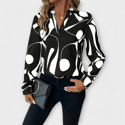 Lara | Elegante blusa estampada con volantes