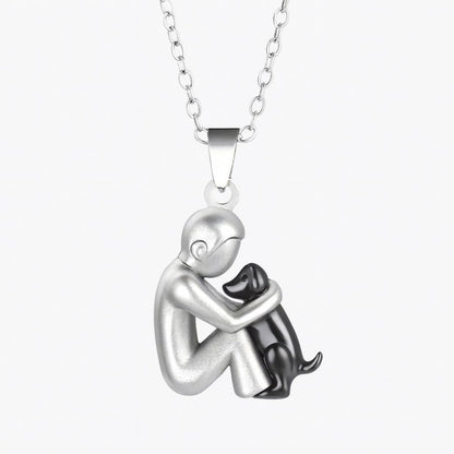 El colgante del abrazo — Collar de mujer y perro