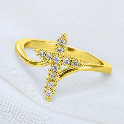 El Anillo de la Gloria — Cruz de plata con detalles de cristal