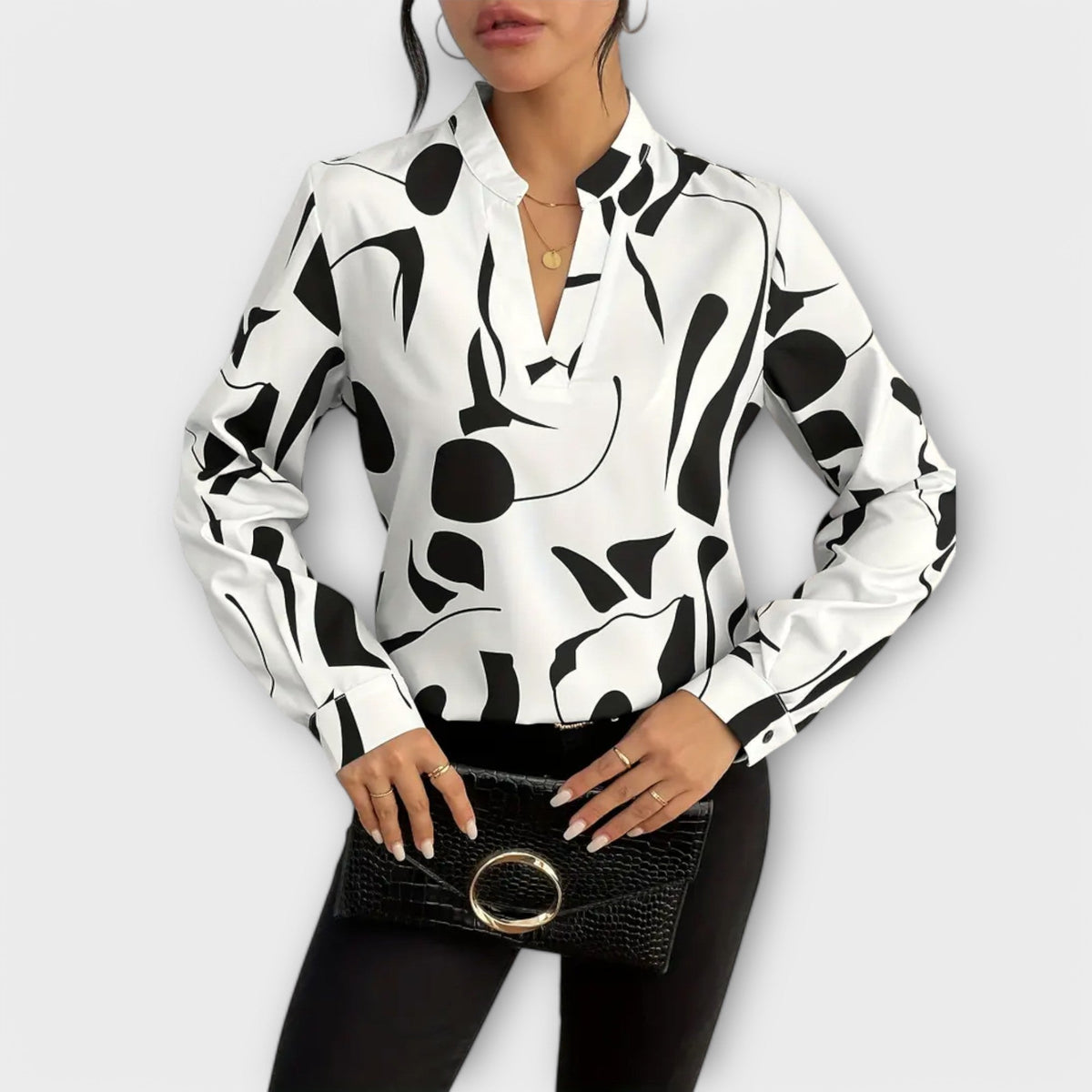 Lara | Elegante blusa estampada con volantes