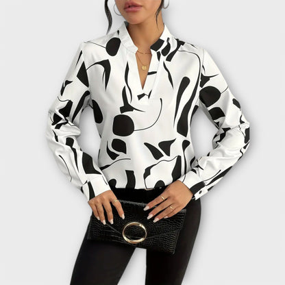 Lara | Elegante blusa estampada con volantes