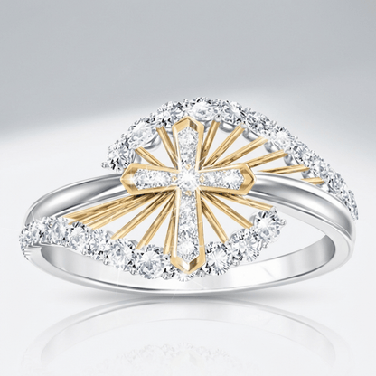El anillo de cruz bicolor — plateado con detalles de cristal