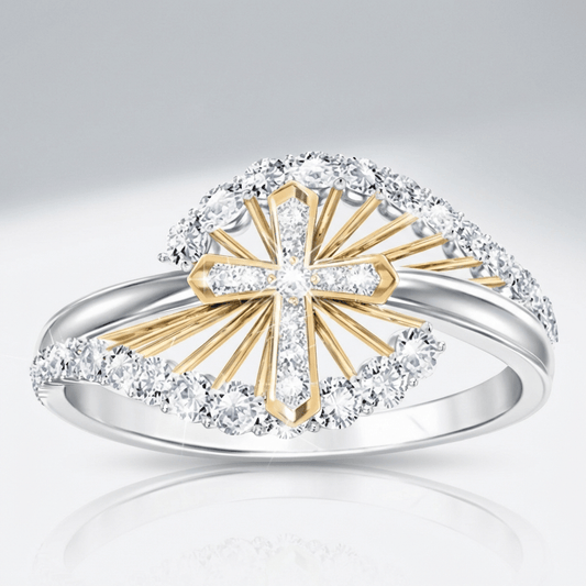 El anillo de cruz bicolor — plateado con detalles de cristal