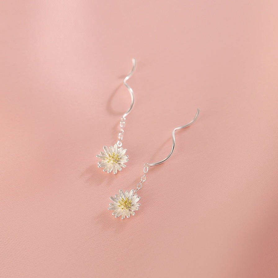 Pendientes de cadena con margaritas dulces