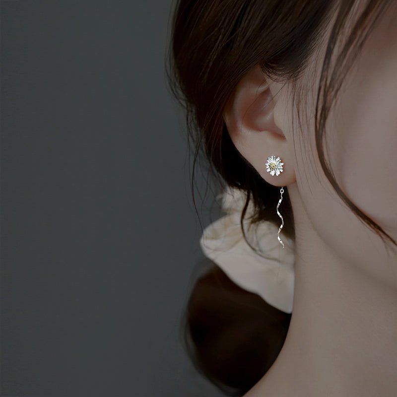 Pendientes de cadena con margaritas dulces
