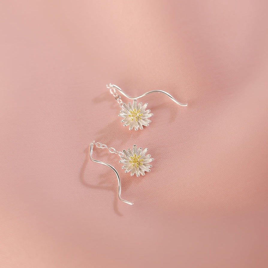 Pendientes de cadena con margaritas dulces