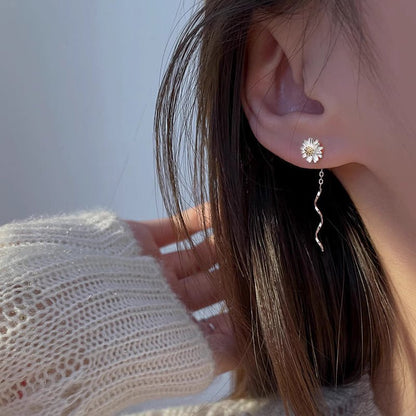 Pendientes de cadena con margaritas dulces