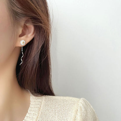 Pendientes de cadena con margaritas dulces